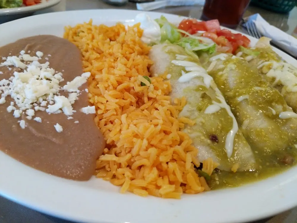 Steak Enchiladas with Rice and Beans
